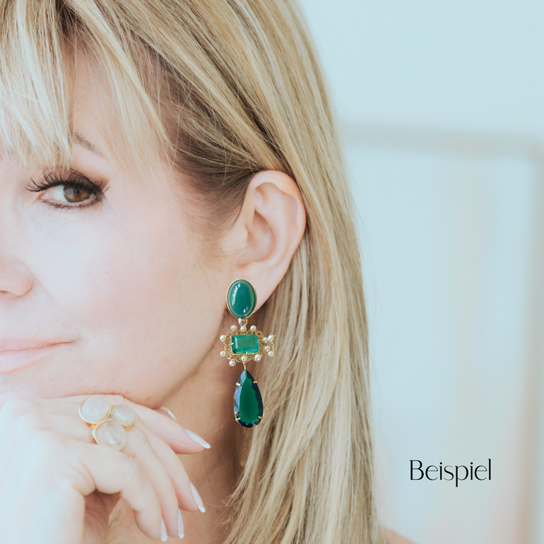 Model wearing the green pendant set with crystal drops only – subtle and lightweight look